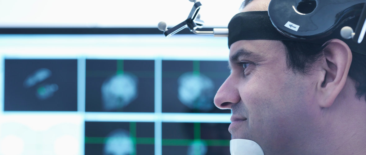 Patient in transcranial magnetic stimulation (TMS)